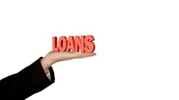 Term loans writing on a hand