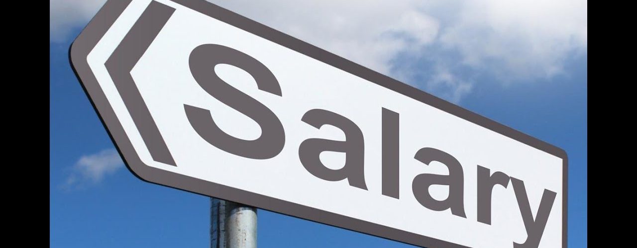 A sign reading Salary - Directors Salary