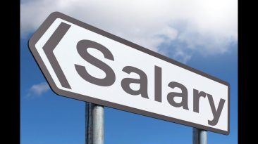 A sign reading Salary - Directors Salary